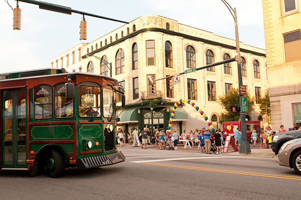 A trolley crossing the intersection of innes and main street in downtown salisbury